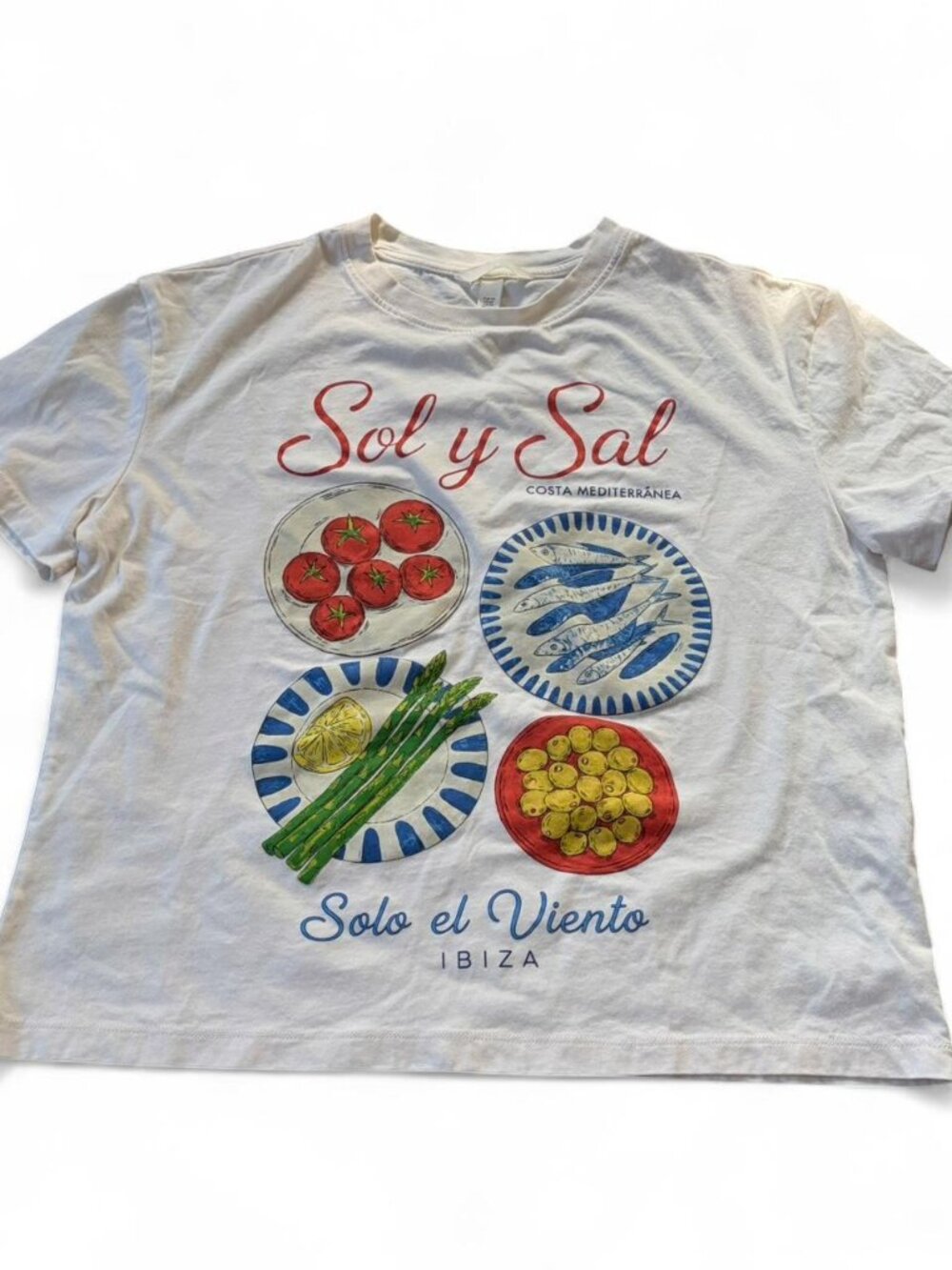 White graphic t-shirt with 'Sol y Sal' and 'Solo el Viento IBIZA size xs